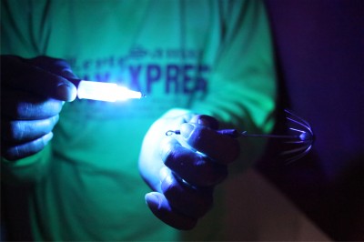 The lighter-like device and a hook the rescued Filipino fishermen used to catch squid &amp; fish while drifting for 40 days at sea. [photo by Eric Whipps]