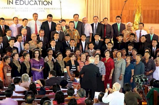 Edward W. Higgins directing a mass choir during Sabbath worship at the Mt. Klabat University (UNKLAB) Pioneer chapel on October 17. Higgins was first president of UNKLAB who served from 1965-1974. [photo contributed by J. Rondonuwu]